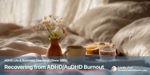 Blog post: Recovering from Burnout with ADHD/AuDHD — a simple breakfast tray in soft morning light with a cup of tea and small flowers, representing the quiet steady work of recovery