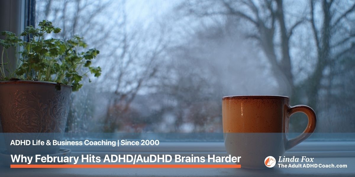 Blog post: Why February Hits ADHD and AuDHD Brains Harder — a steamy window looking out at a grey February sky with a warm ceramic mug on the sill, representing the seasonal dopamine dip